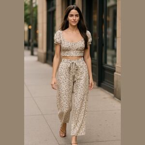 Get Ready to Slay in Style with Our Daisy Print Cropped Top and Wide Leg…